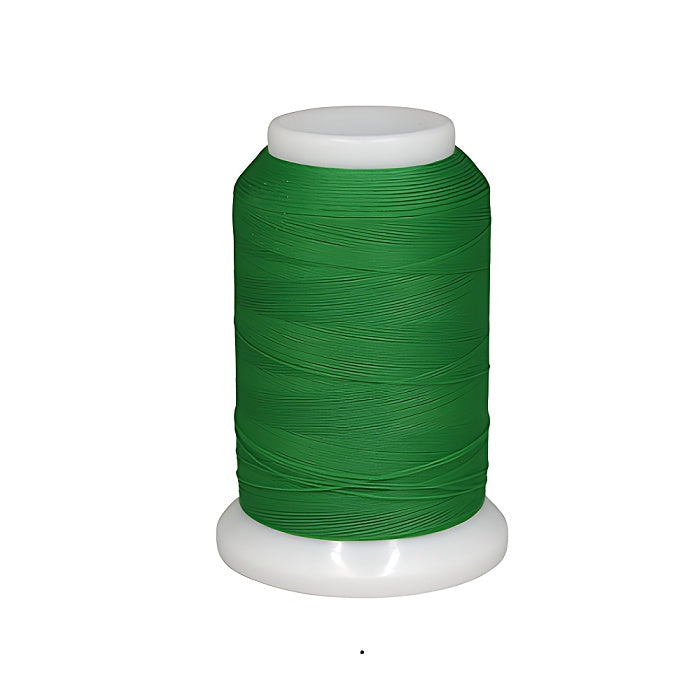Spool of green woolly nylon thread.