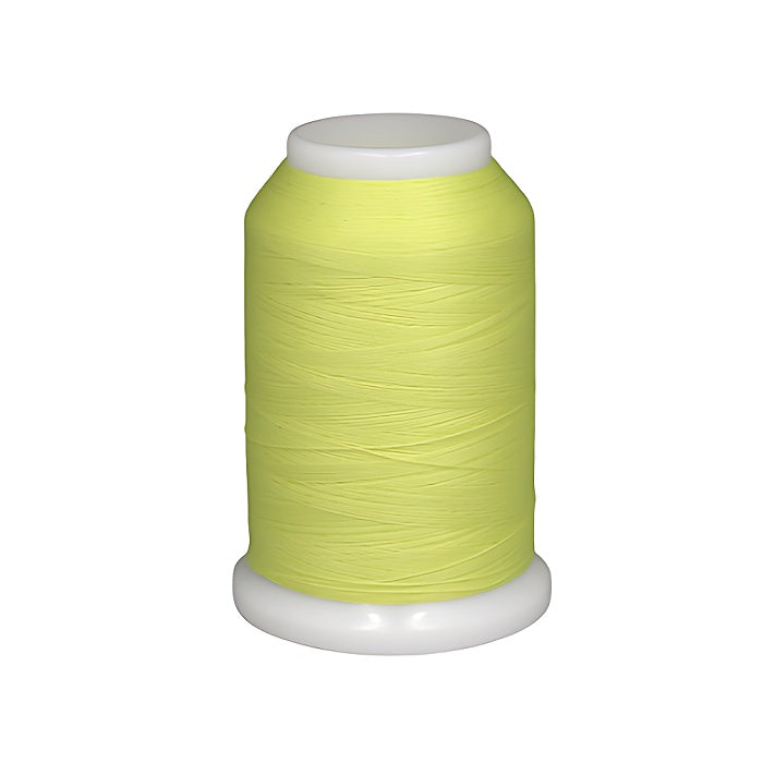 Spool of yellow woolly nylon thread.