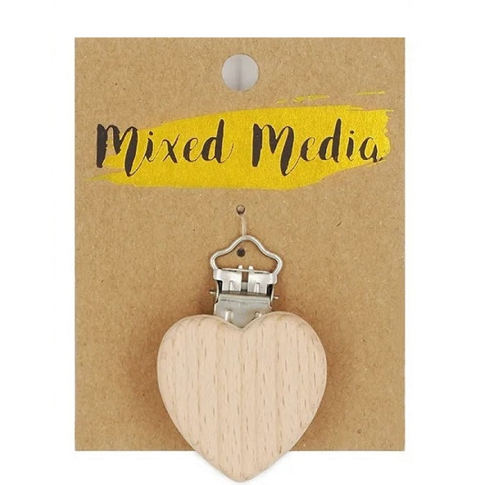 Wooden heart shaped clip on cardboard backing.