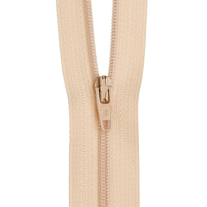 Light beige nylon dress zip.