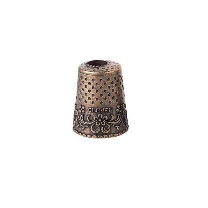 Bronze toned antique thimble design pencil sharpener.