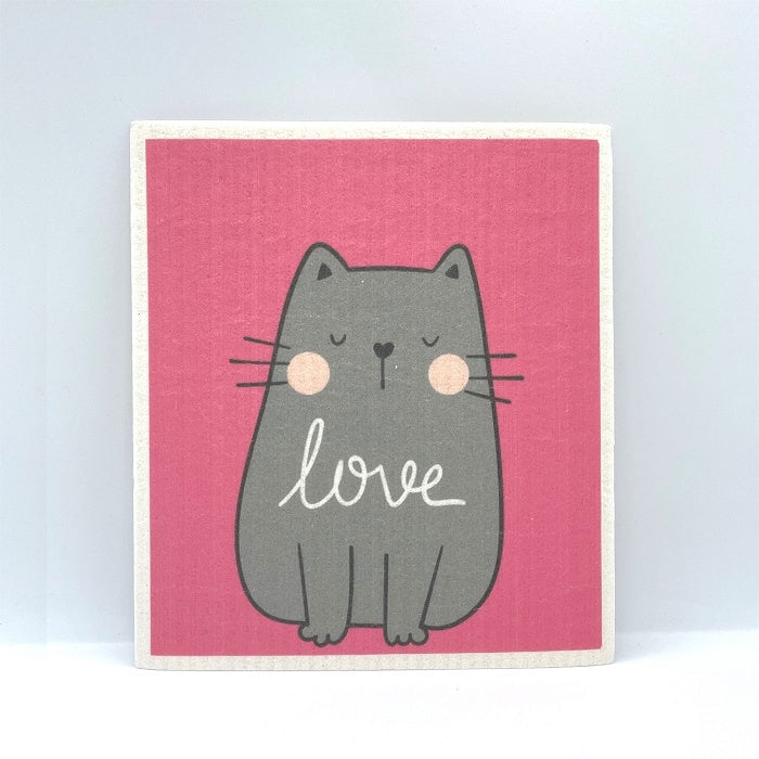 Grey cat with eyes closed on a pink background.