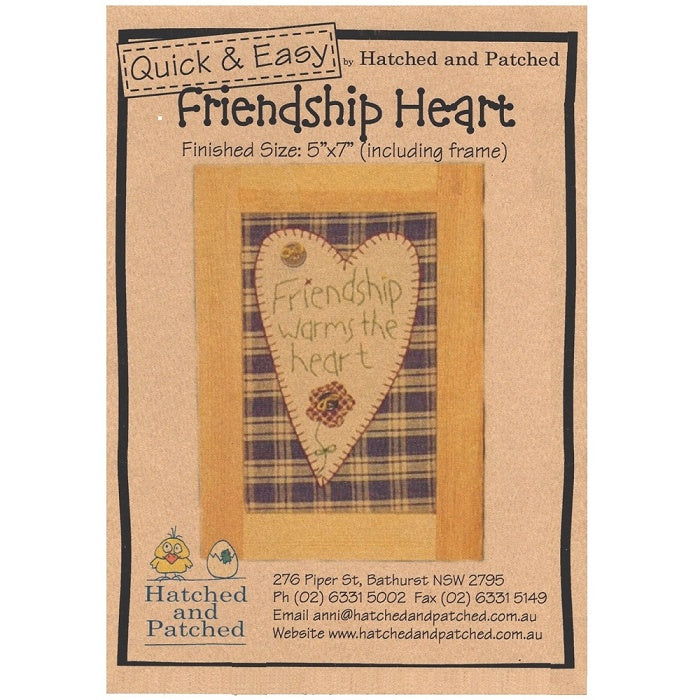 Pattern cover of wall hanging with friendship heart applique.