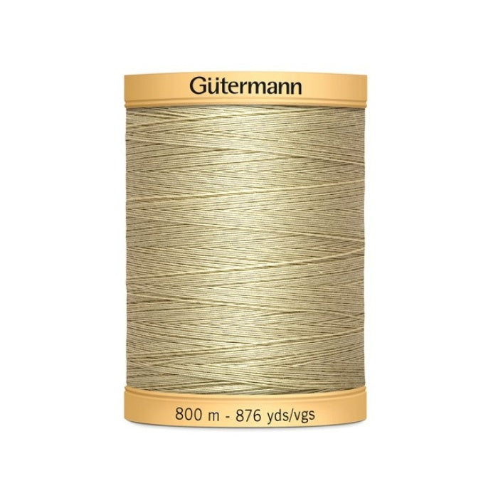 Spool of mid beige thread with Gutermann 800m branding.