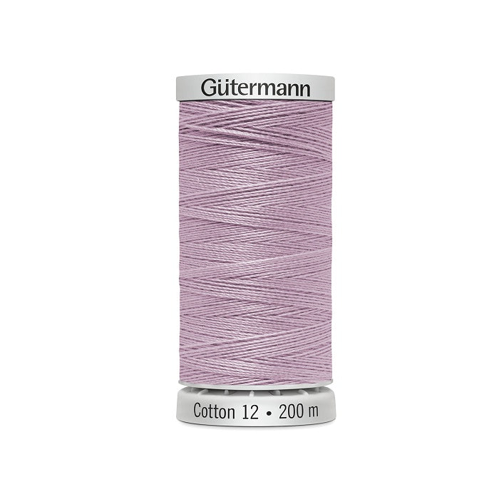 Spool of mauve thread with Gutermann Cotton 12 branding.