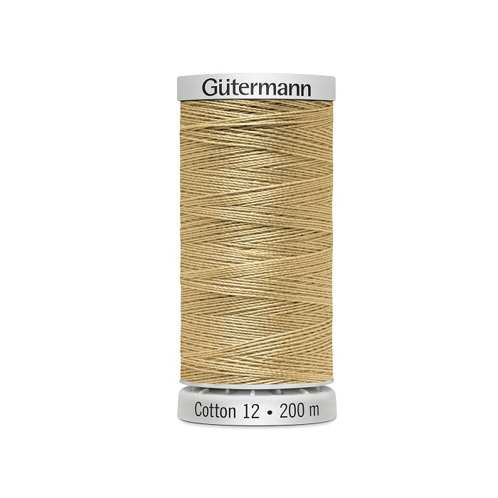 Spool of rich beige thread with Gutermann Cotton 12 branding.