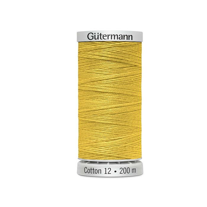 Spool of ochre yellow thread with Gutermann Cotton 12 branding.