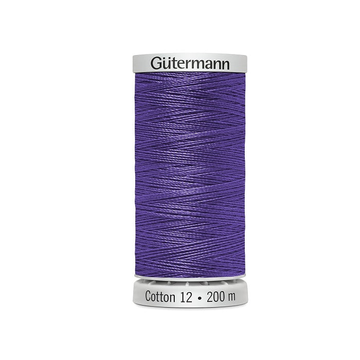 Spool of purple thread with Gutermann Cotton 12 branding.