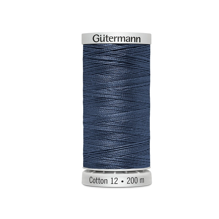 Spool of medium cornflower blue thread with Gutermann Cotton 12 branding.