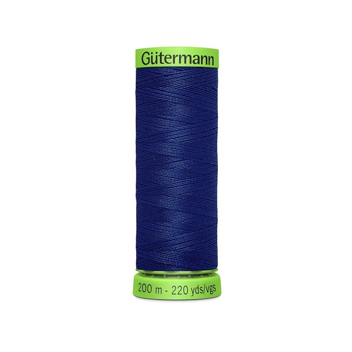Spool of dark blue extra fine thread with Gutermann branding.
