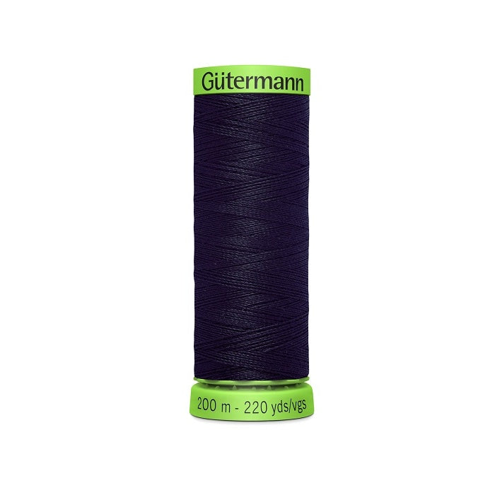 Spool of navy extra fine thread with Gutermann branding.