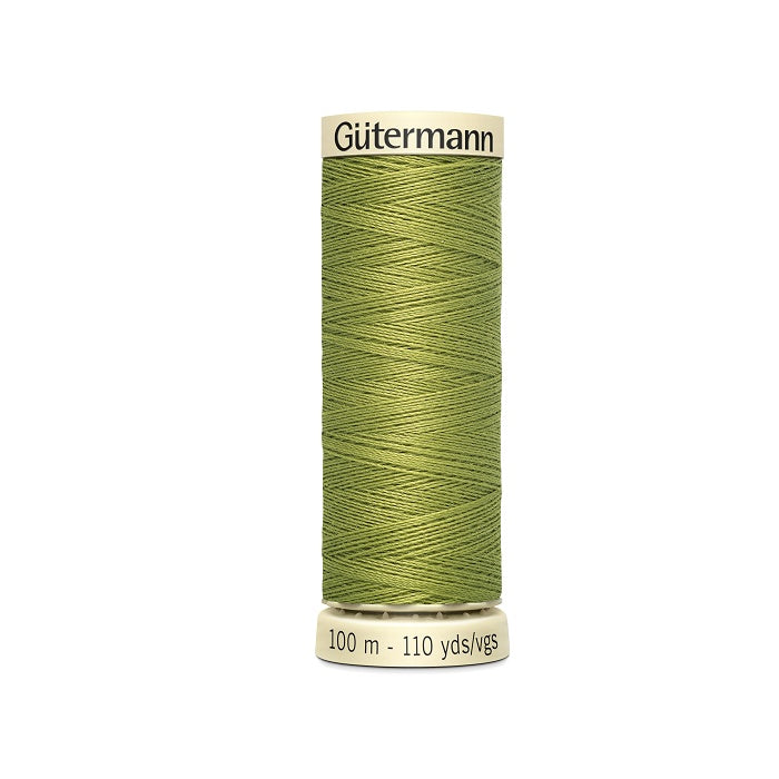 Spool of green thread with Gutermann branding.