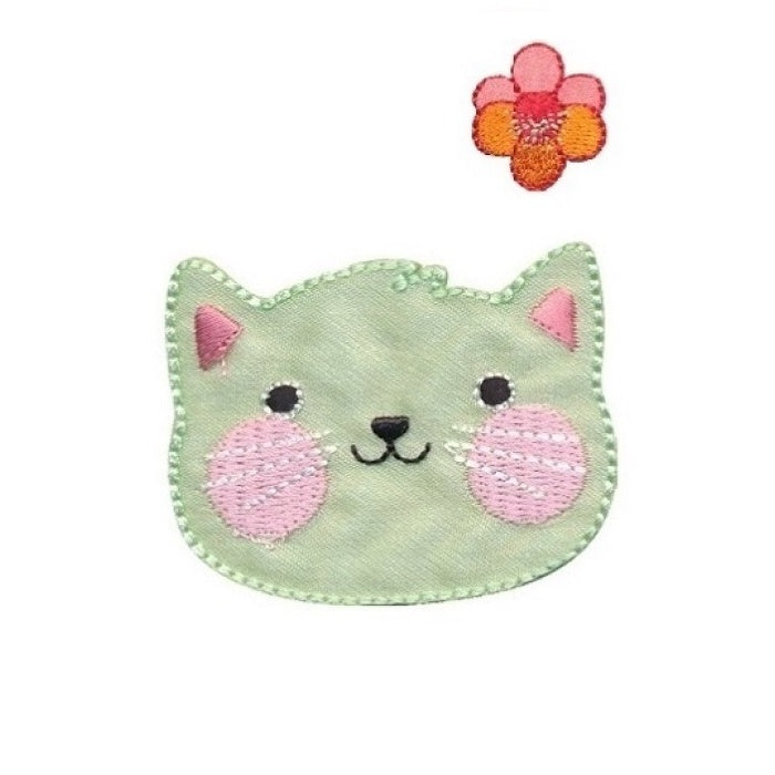 Applique of a light green smiling cat face.