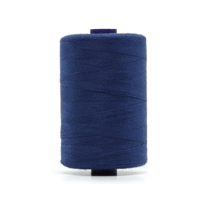 Spool of royal blue polyester sewing thread.