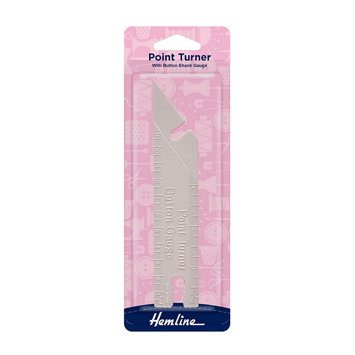 Packaged plastic point turner with Hemline branding.