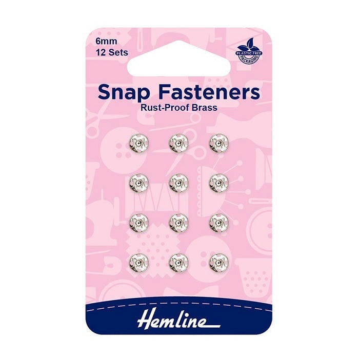 Pack of 6mm silver snap fasteners with Hemline branding.