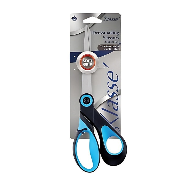 Packaged dressmaking scissors with blue and black handles.