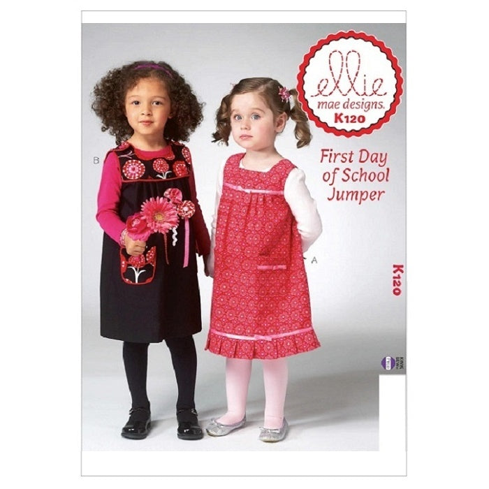 Pattern cover with two children in tunic dresses.
