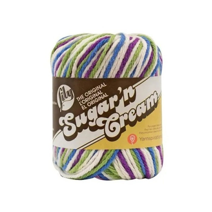 Ball of green, purple, blue and white yarn with Lily Sugar'n Cream branding.