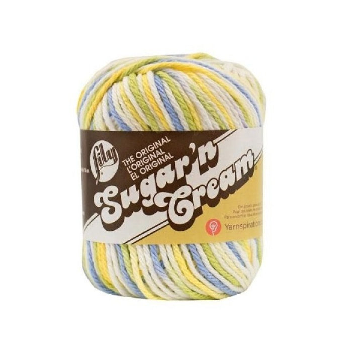 Ball of yellow, blue, green and white yarn with Lily Sugar'n Cream branding.