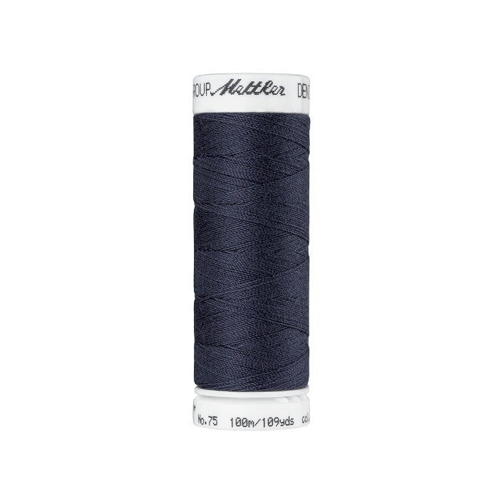 Spool of dark grey thread with Mettler branding.