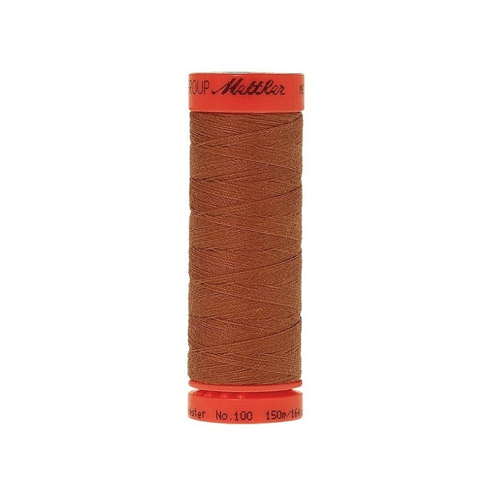 Spool of Mettler 150m brown thread.