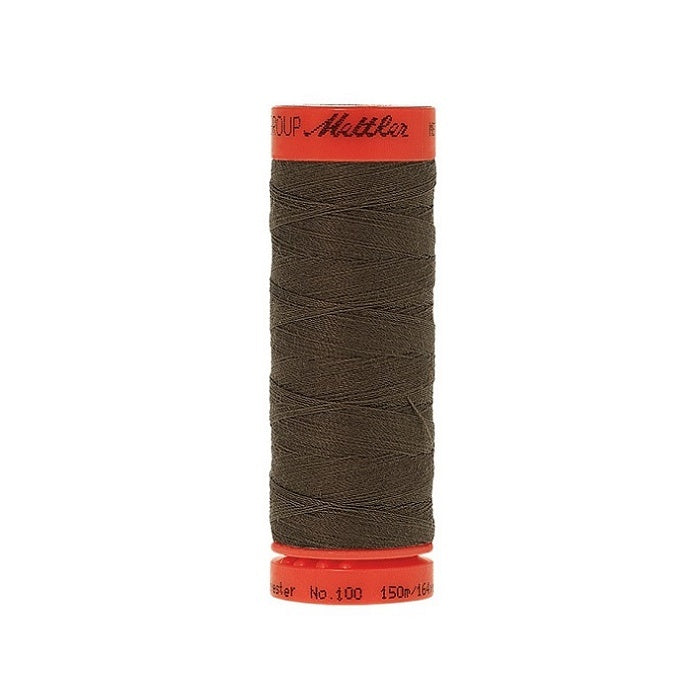 Spool of Mettler 150m very dark brown thread.