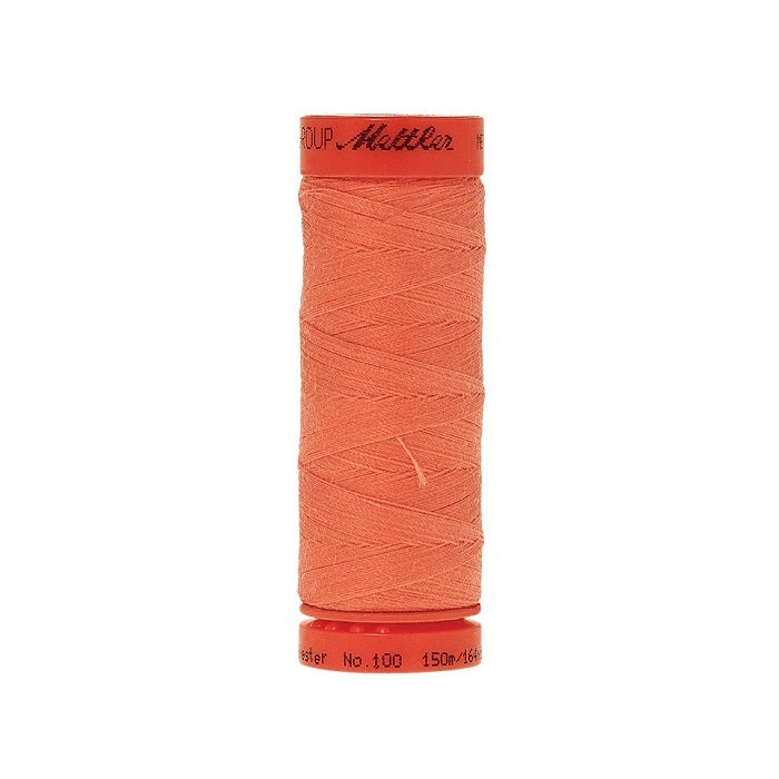 Spool of Mettler 150m pink orange thread.