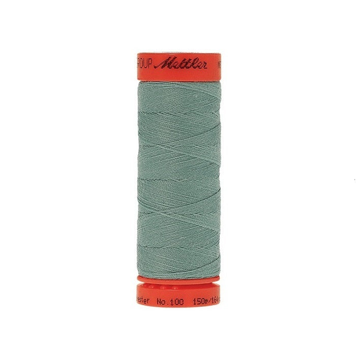 Spool of Mettler 150m light green thread.