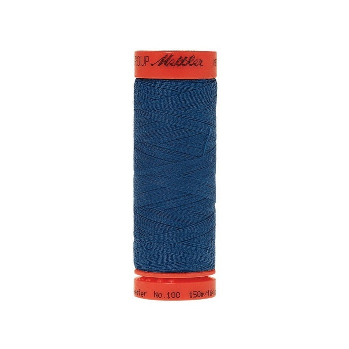 Spool of Mettler 150m blue thread.