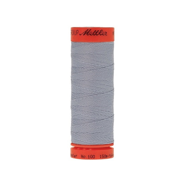 Spool of Mettler 150m blue grey thread.