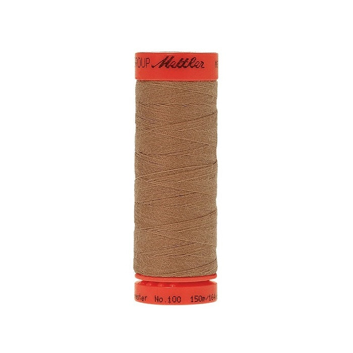 Spool of Mettler 150m light brown thread.