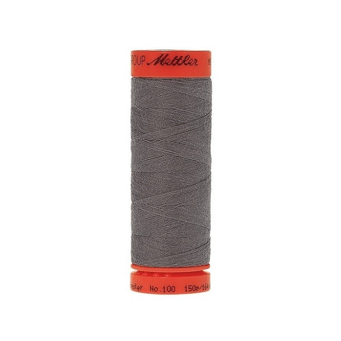 Spool of Mettler 150m dark grey thread.