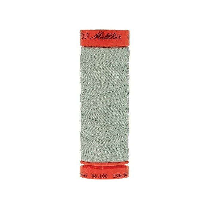 Spool of Mettler 150m light green thread.