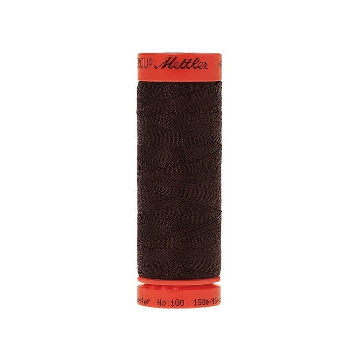 Spool of Mettler 150m dark brown thread.