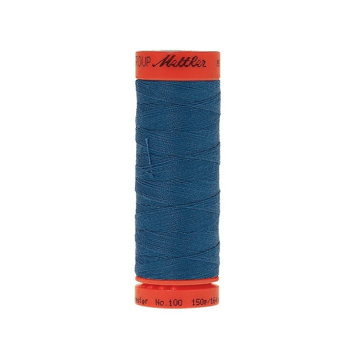 Spool of Mettler 150m blue thread.