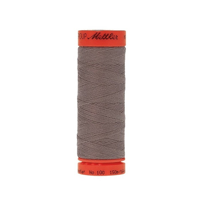 Spool of Mettler 150m grey brown thread.