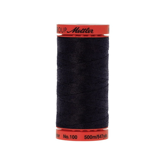 Spool of Mettler 500m very dark blue thread.