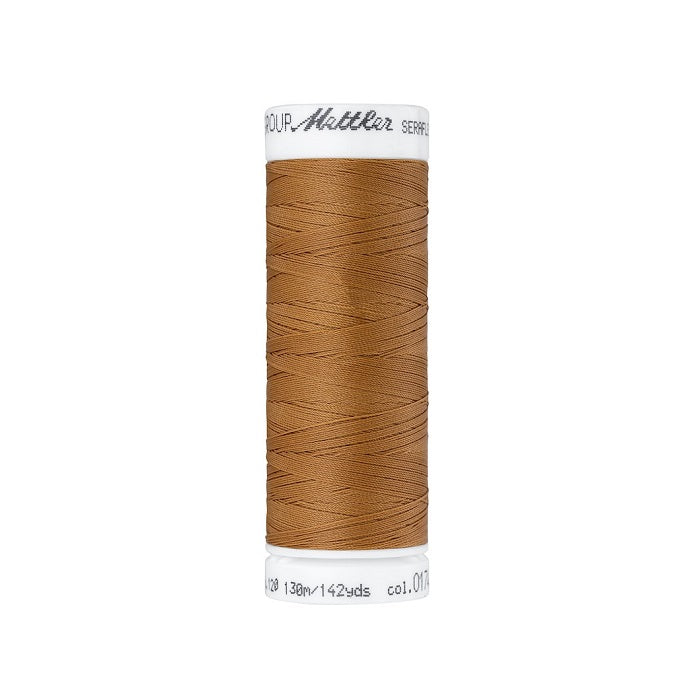 Spool of warm brown thread with Mettler Seraflex branding.