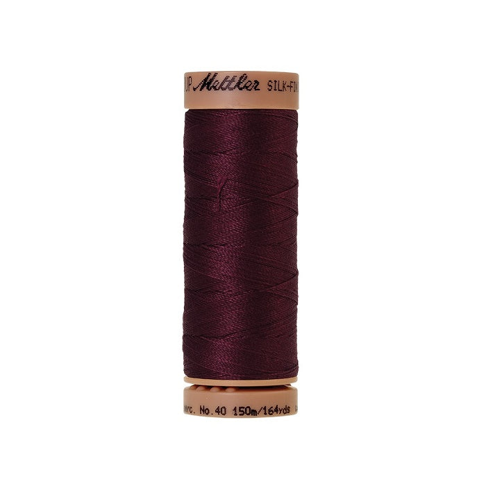 Burgundy thread with Mettler Cotton 40 branding.