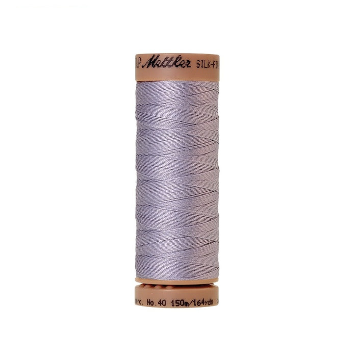 Light blue thread with Mettler Cotton 40 branding.