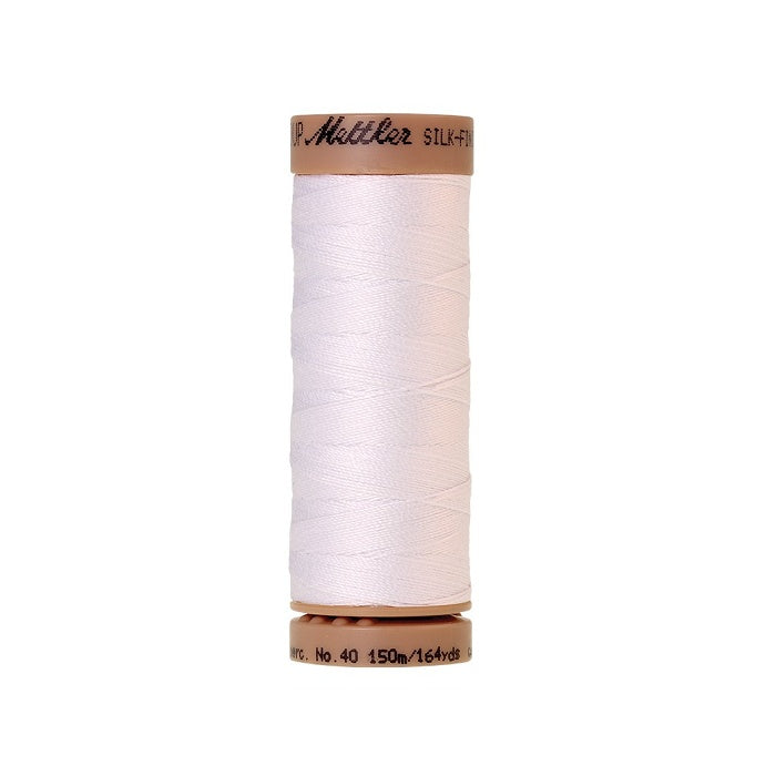 White thread with Mettler Cotton 40 branding.