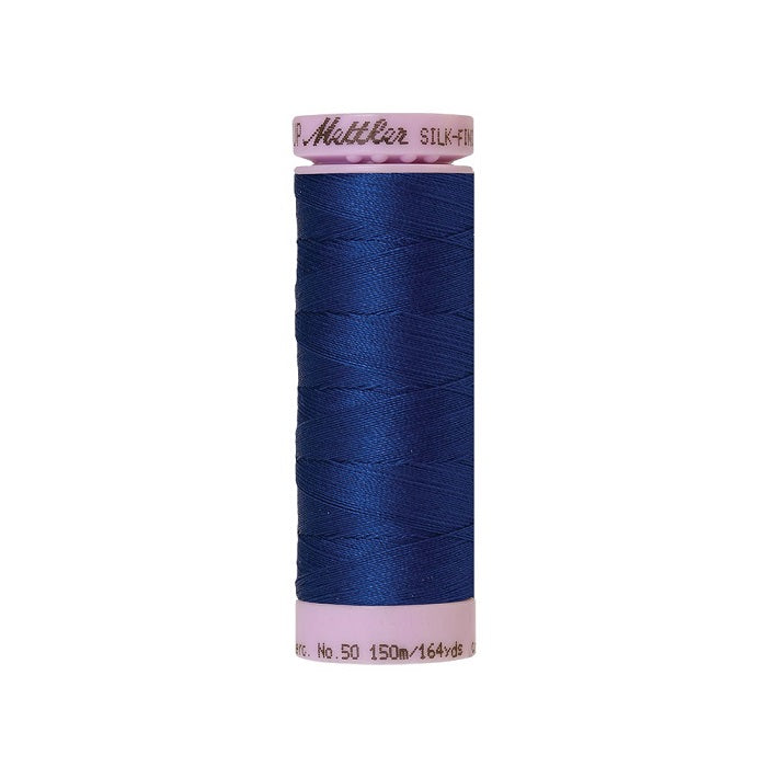 Dark blue thread with Mettler Cotton 50 branding.