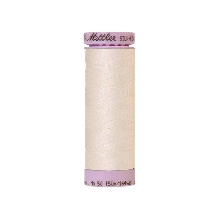 Off white thread with Mettler Cotton 50 branding.