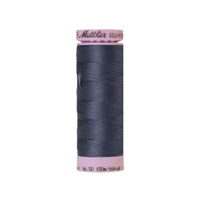 Dark blue thread with Mettler Cotton 50 branding.