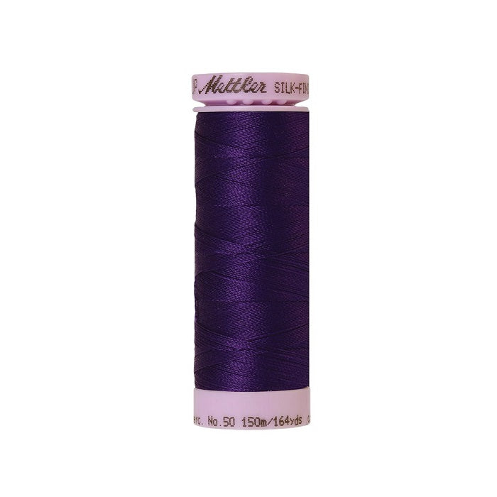 Dark purple thread with Mettler Cotton 50 branding.
