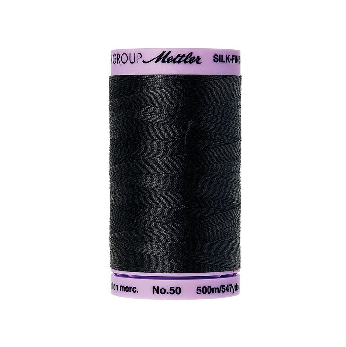Black thread with Mettler Cotton 50 branding.