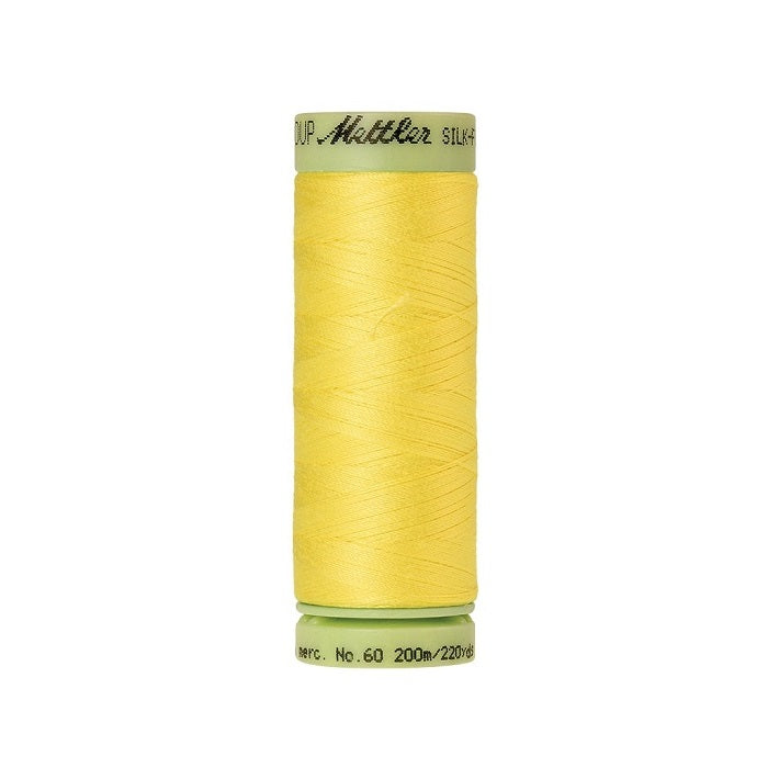 Yellow thread with Mettler Cotton 60 branding.