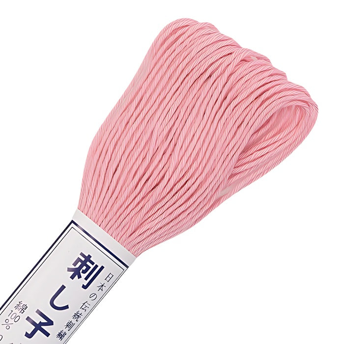 Light pink sashiko thread with Olympus branding.