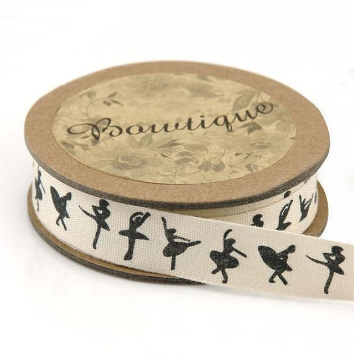Spool of ribbon with ballerina silhouettes.
